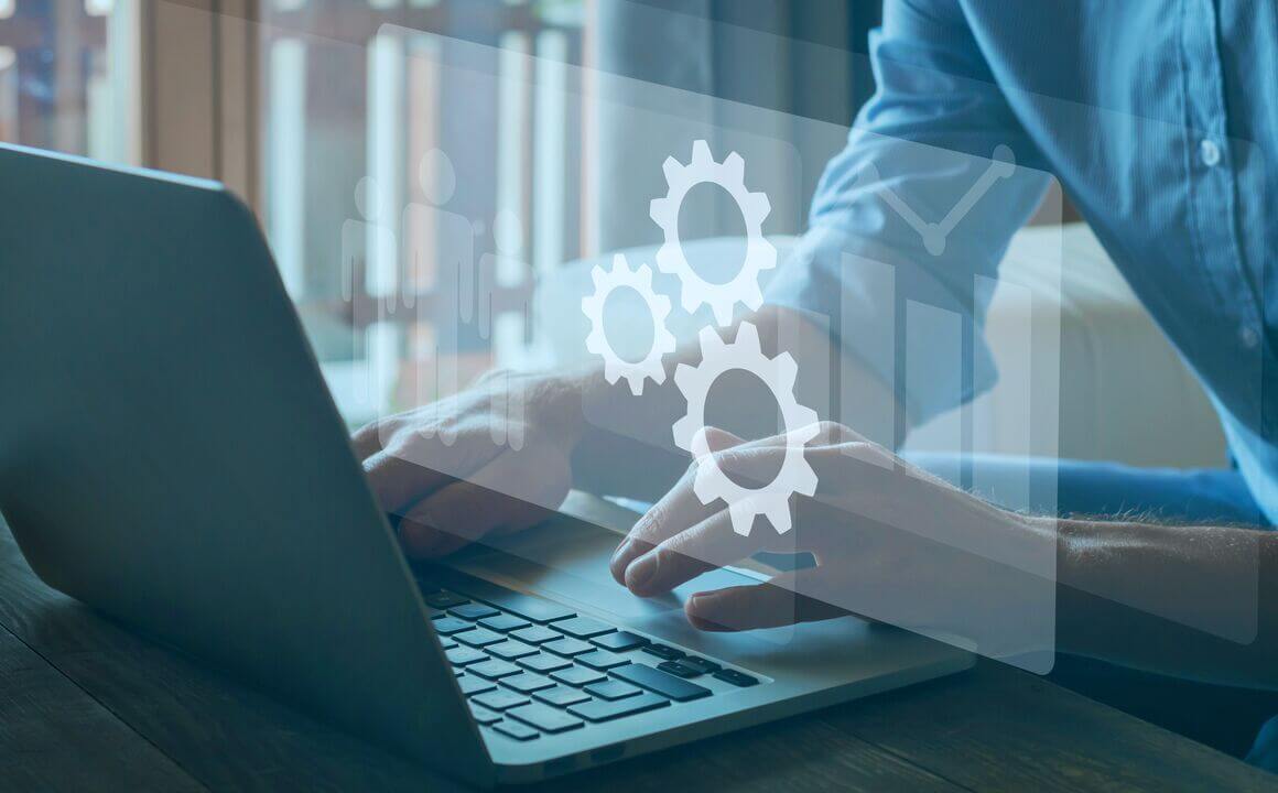 Man typing on laptop