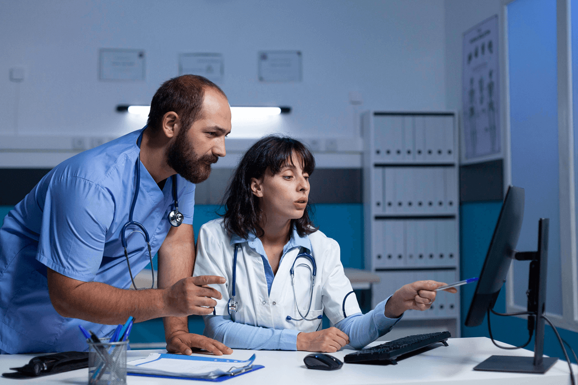 Two healthcare workers talking